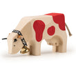 Cow 2 eating red (14 x 8 x 3,5 cm)